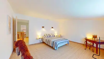 Un ou plusieurs lits dans un hébergement de l'établissement Calme et chaleureux gîte de campagne.