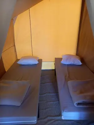 Un ou plusieurs lits dans un hébergement de l'établissement Camping Onlycamp Les Premières Vignes