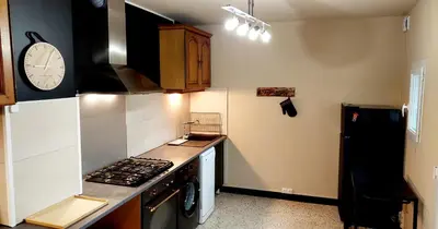 Cuisine ou kitchenette dans l'établissement Gite du Hameau