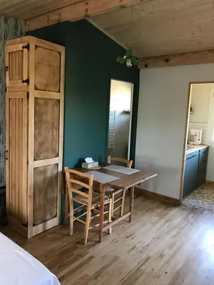 Un ou plusieurs lits dans un hébergement de l'établissement Chalet de la Baume