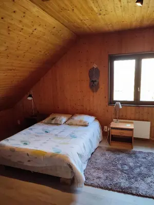 Un ou plusieurs lits dans un hébergement de l'établissement Chambre d'hôtes à la campagne 