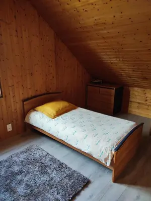 Un ou plusieurs lits dans un hébergement de l'établissement Chambre d'hôtes à la campagne 