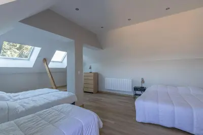 Un ou plusieurs lits dans un hébergement de l'établissement CABANA & La Villa sur la Colline - Au Calme