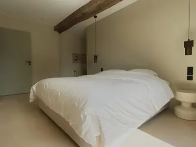 Un ou plusieurs lits dans un hébergement de l'établissement Le Clos des Ursulines // Maison seigneuriale du XVIe siècle