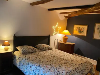 Un ou plusieurs lits dans un hébergement de l'établissement Le pigeonnier de Saint-Loup Bed and Breakfast