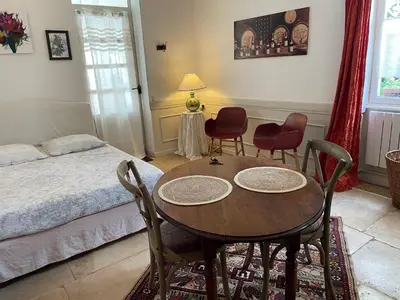 Un ou plusieurs lits dans un hébergement de l'établissement La Cuverie du Château le Four à Pain