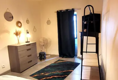Un ou plusieurs lits dans un hébergement de l'établissement Appartement en plein coeur de Mâcon H