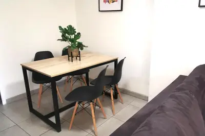 Coin salon dans l'établissement Appartement en plein coeur de Mâcon H