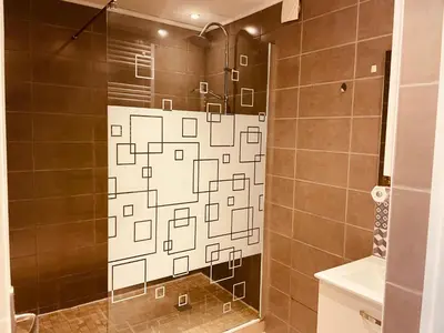 Salle de bains dans l'établissement Appartement 2 chambres avec parking privé gratuit