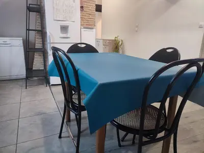 Cuisine ou kitchenette dans l'établissement Grand Appartement chaleureux