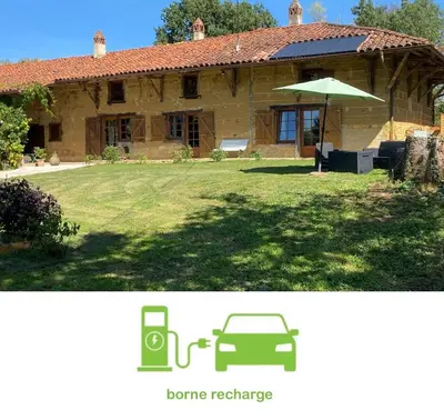 Jardin de l'établissement Appartement indépendant 45m2 - Ferme de Chamonal