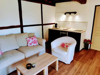 Coin salon dans l'établissement Appartement indépendant 45m2 - Ferme de Chamonal