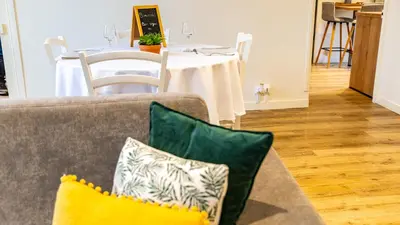 Coin salon dans l'établissement Le Cocon d'Anna