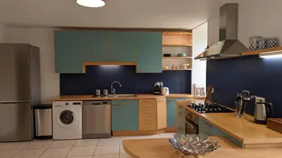Cuisine ou kitchenette dans l'établissement Le Moulin de la Motte - 12 personnes