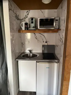 Cuisine ou kitchenette dans l'établissement Le cocoon Nuits
