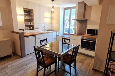 Cuisine ou kitchenette dans l'établissement Le 56 Faubourg - Proche centre - Parking gratuit