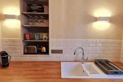 Cuisine ou kitchenette dans l'établissement Le 56 Faubourg - Proche centre - Parking gratuit