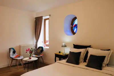 Un ou plusieurs lits dans un hébergement de l'établissement Maison Céleste