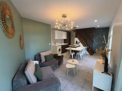 Coin salon dans l'établissement Chez Emma et Louise - Maison individuelle avec stationnement gratuit
