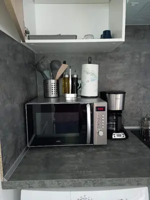 Cuisine ou kitchenette dans l'établissement Logements neufs tout équipés, idéal travail mobilité