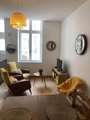 Télévision ou salle de divertissement dans l'établissement Appartement en duplex à Auxonne
