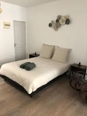 Un ou plusieurs lits dans un hébergement de l'établissement Appartement en duplex à Auxonne