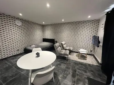 Coin salon dans l'établissement Joli appartement