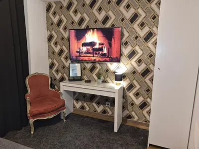 Télévision ou salle de divertissement dans l'établissement Cosy Corner - Appartement spa - Jacuzzi