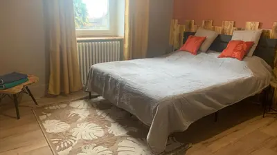 Un ou plusieurs lits dans un hébergement de l'établissement La casa
