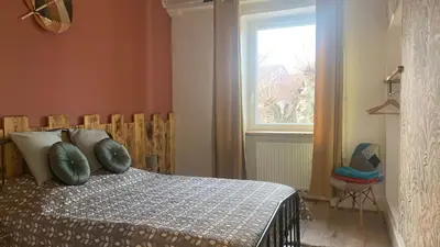 Un ou plusieurs lits dans un hébergement de l'établissement La casa