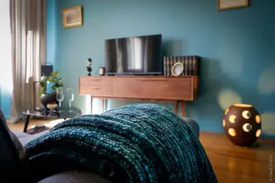 Télévision ou salle de divertissement dans l'établissement Do Ré Mi