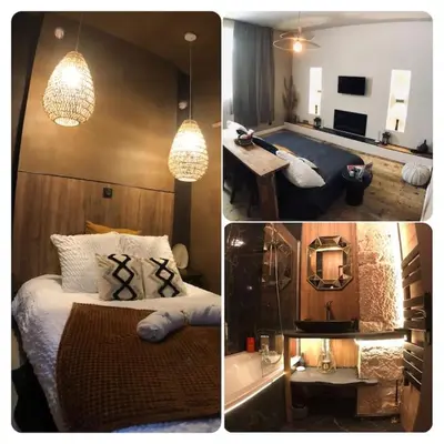 Un ou plusieurs lits dans un hébergement de l'établissement Le TULUM, T2, Hyper-centre, Place aux herbes