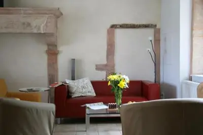Coin salon dans l'établissement La Fontenelle - Lovely Holiday House with Swimming Pool