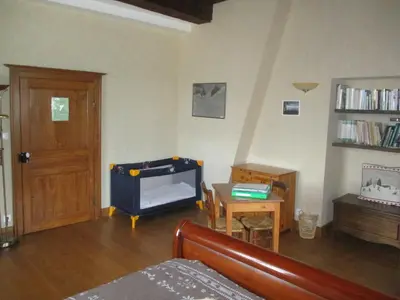 Un ou plusieurs lits dans un hébergement de l'établissement Appartement La petite Résie