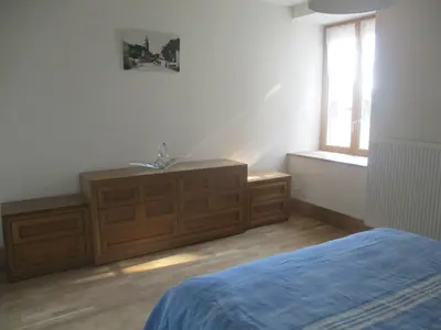 Un ou plusieurs lits dans un hébergement de l'établissement Appartement La petite Résie