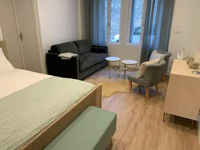 Un ou plusieurs lits dans un hébergement de l'établissement Appartement chaleureux