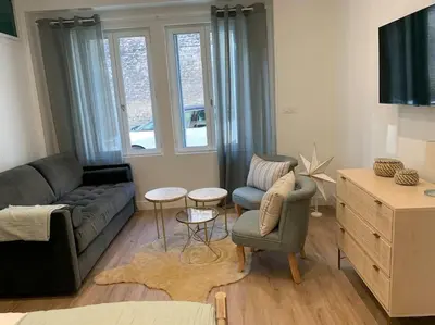 Télévision ou salle de divertissement dans l'établissement Appartement chaleureux