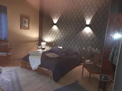 Un ou plusieurs lits dans un hébergement de l'établissement chambre du jura