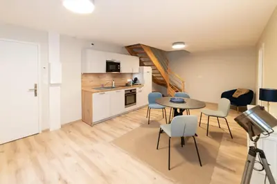 Cuisine ou kitchenette dans l'établissement Les coursives appartements
