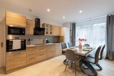 Cuisine ou kitchenette dans l'établissement La Cascade
