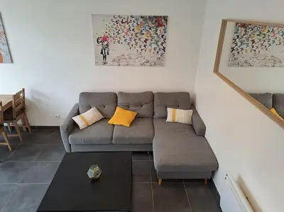Coin salon dans l'établissement Bel Appartement Grande Terrasse avec parking à Dijon