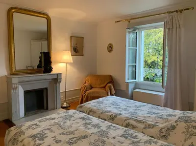 Un ou plusieurs lits dans un hébergement de l'établissement Le Clos- Le Pavillon