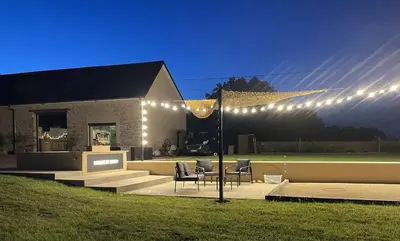 Jardin de l'établissement La Suite Bien Être & Luxe au Domaine du Moulin