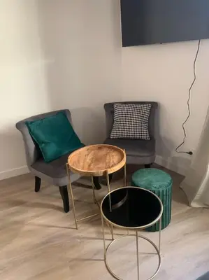 Télévision ou salle de divertissement dans l'établissement Appartement velouté