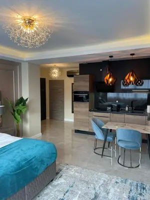 Cuisine ou kitchenette dans l'établissement NUITS D'HERMES & Spa