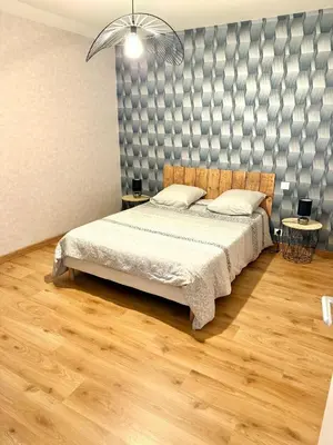 Un ou plusieurs lits dans un hébergement de l'établissement Le Petit Phuket - Proche du centre ville de Mâcon - Appartement confortable et calme - Stationnement facile à proximité