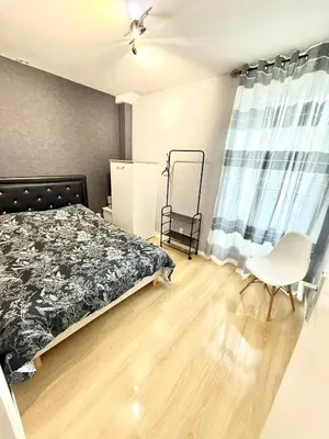 Un ou plusieurs lits dans un hébergement de l'établissement Le Rétro - Appartement 2 chambres confortable et calme - Proche du centre ville de Mâcon - Stationnement facile à proximité