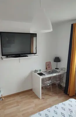 Télévision ou salle de divertissement dans l'établissement Idéalement situé pour tous Dijon