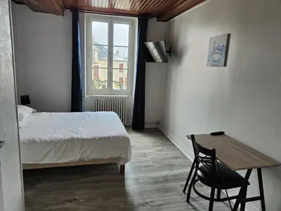 Un ou plusieurs lits dans un hébergement de l'établissement hotel du Nord