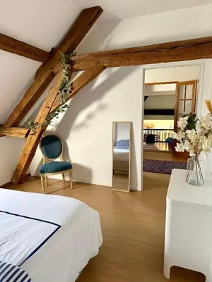 Un ou plusieurs lits dans un hébergement de l'établissement Chaleureuse maison rustique, vue vestige romain